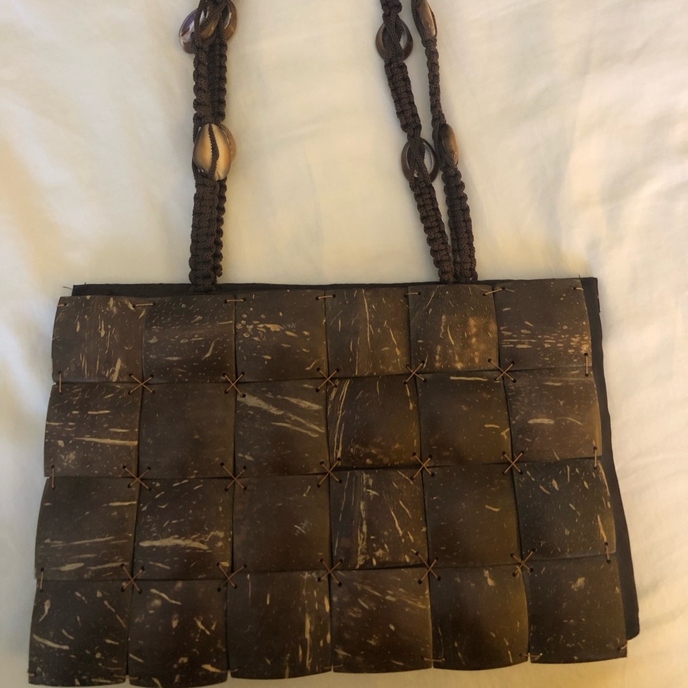 Women’s coconut shell bag bought at a Hawaiian festival and used once